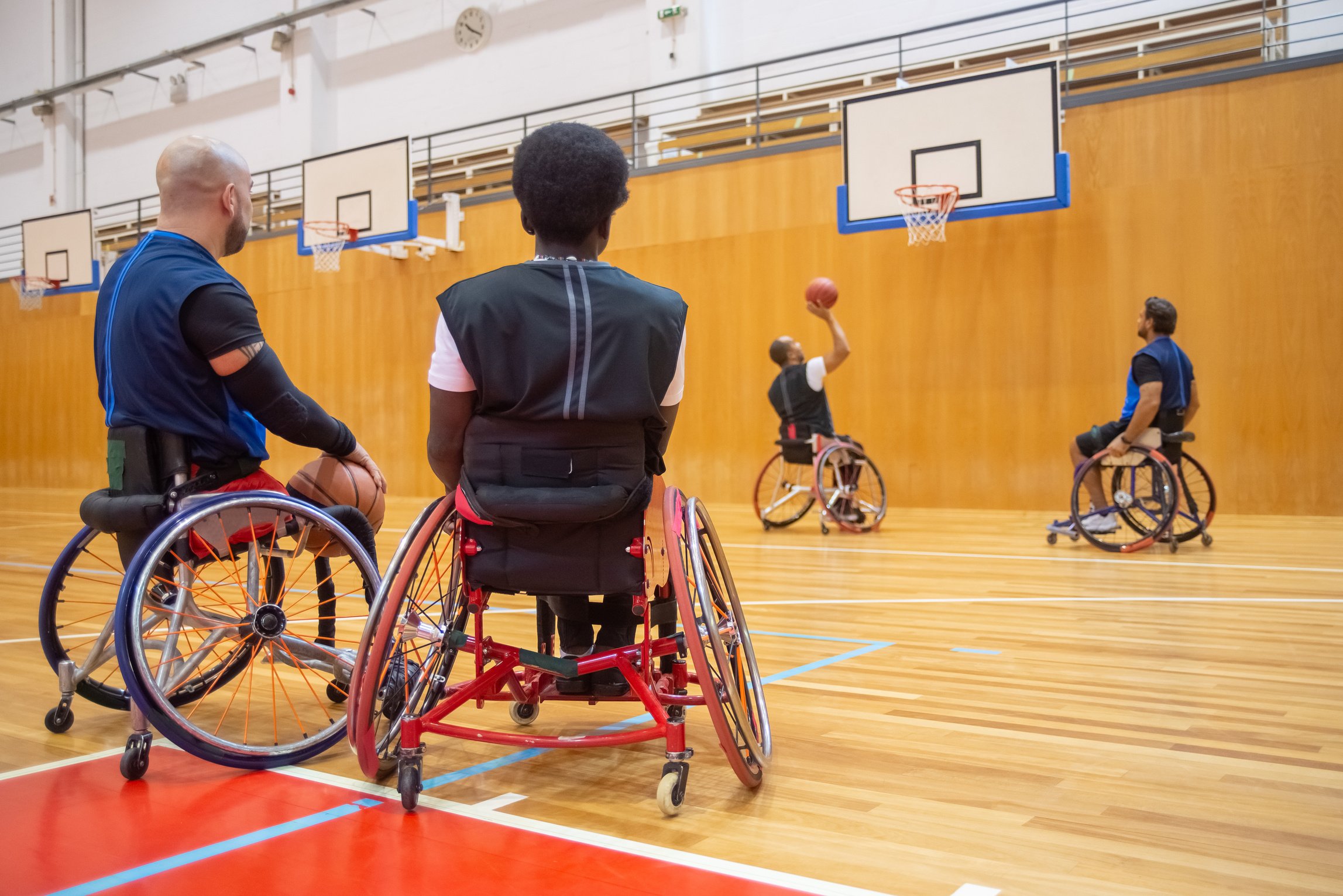 Men on Wheelchair Playing Basketball